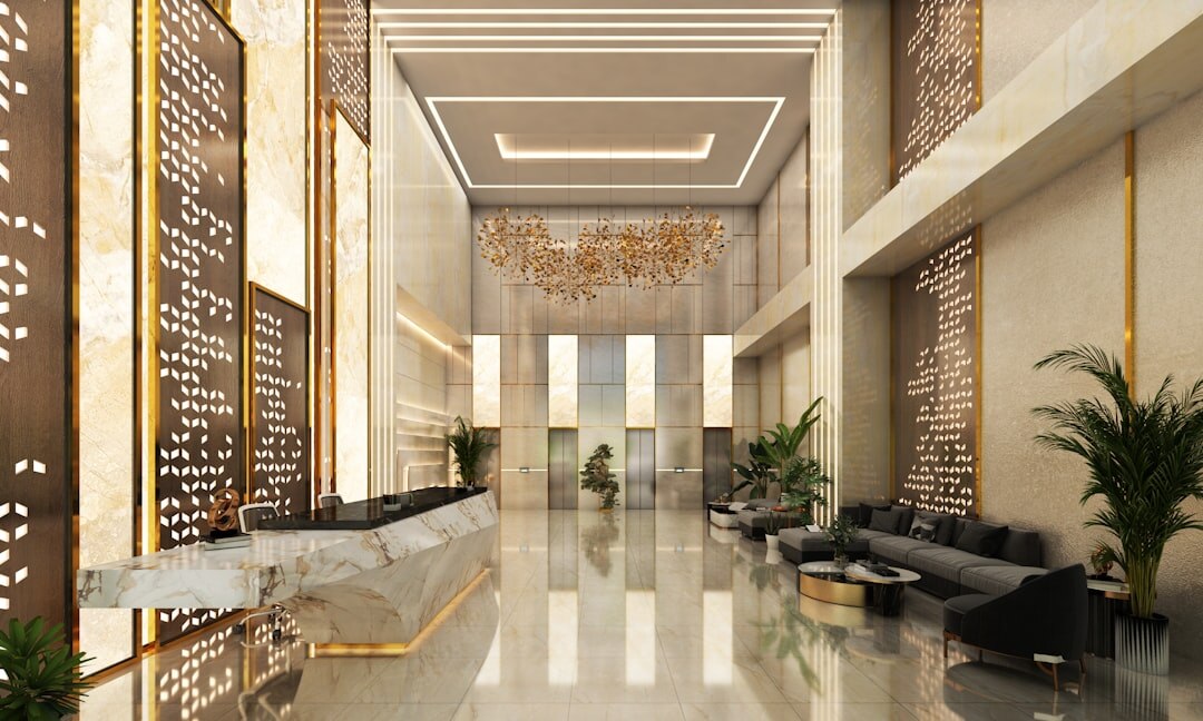Elegant reception desk with orchids and marble accents